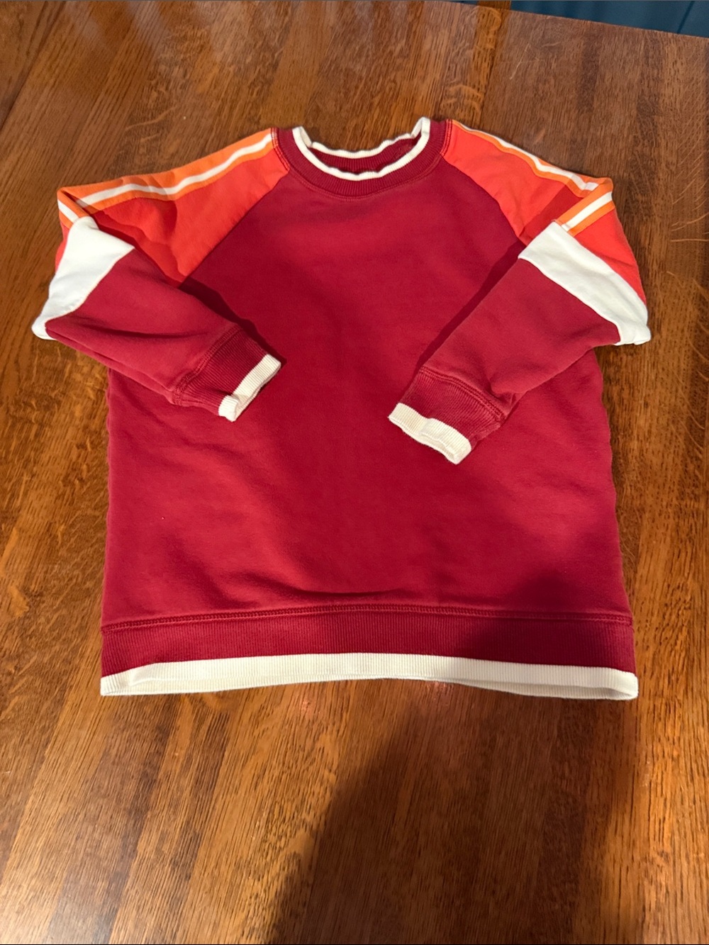 Hanna Andersson Red Sweatshirt with Orange and White Sleeve Stripes